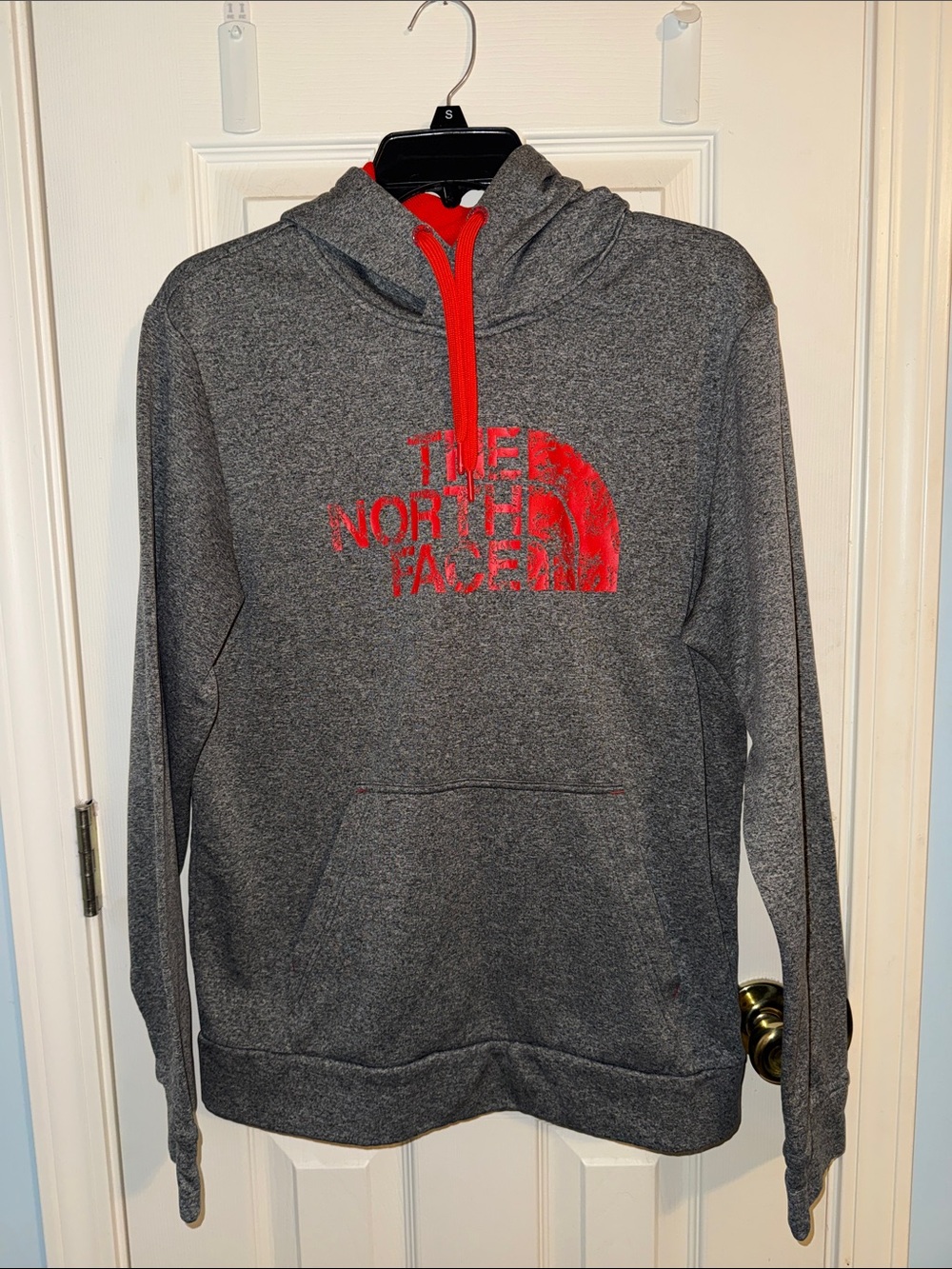 The North Face Men’s Heather Gray Hoodie with Red Logo and Drawcord